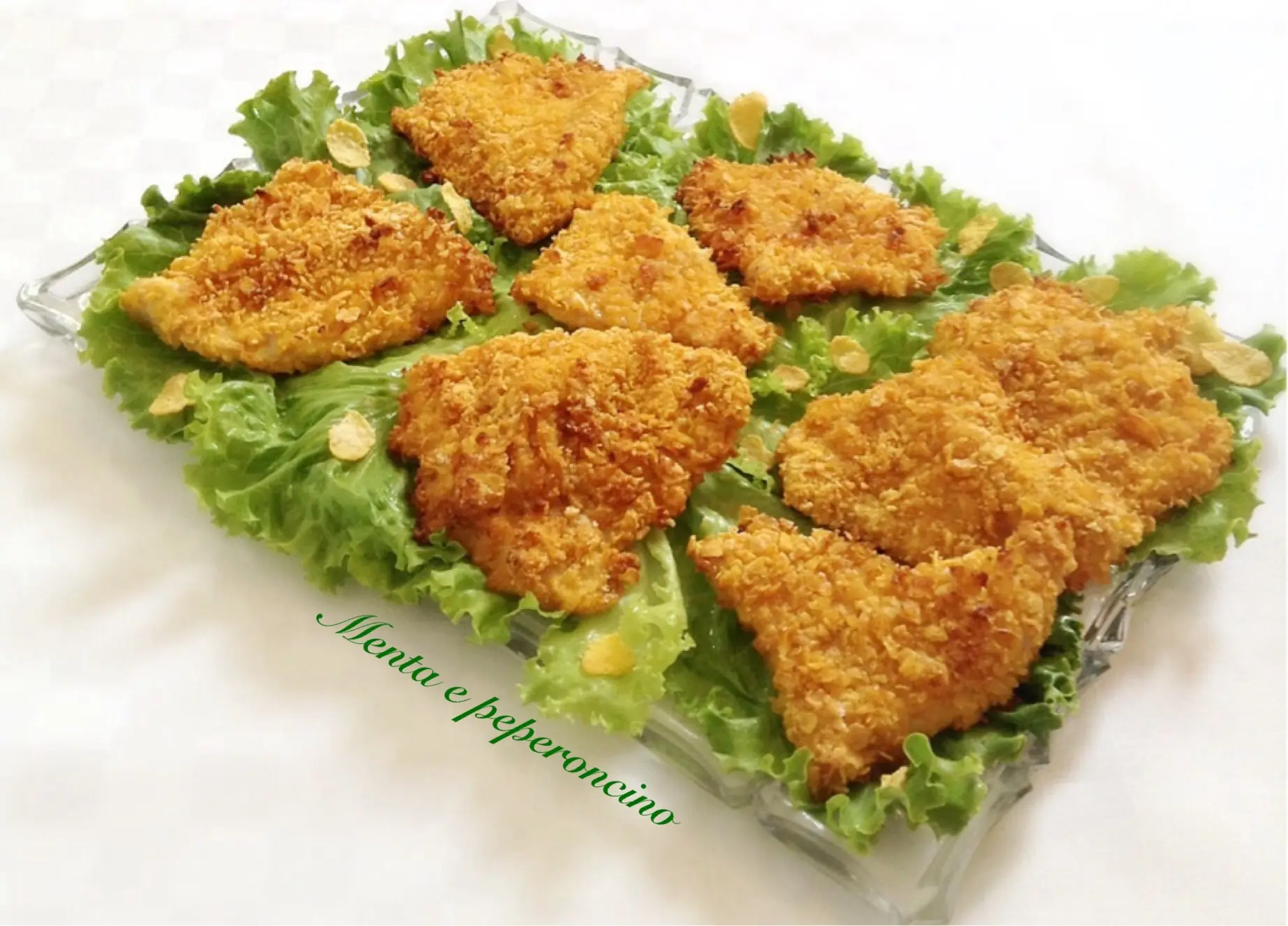 Cotolette di tacchino con corn flakes al forno