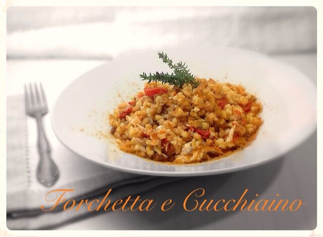 Fregola con spigola, pomodorini e olio Corrias al timo