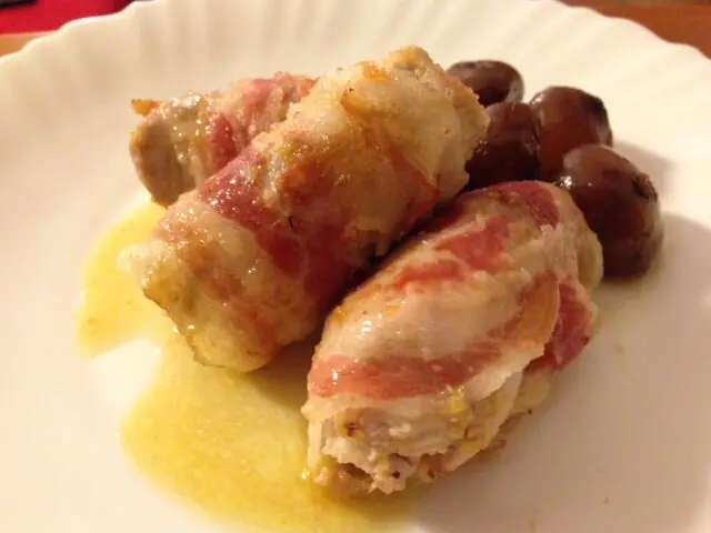 Involtini di lonza con pistacchi e pancetta