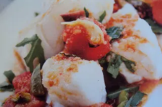 Merluzzo al profumo di rucola e pomodorini