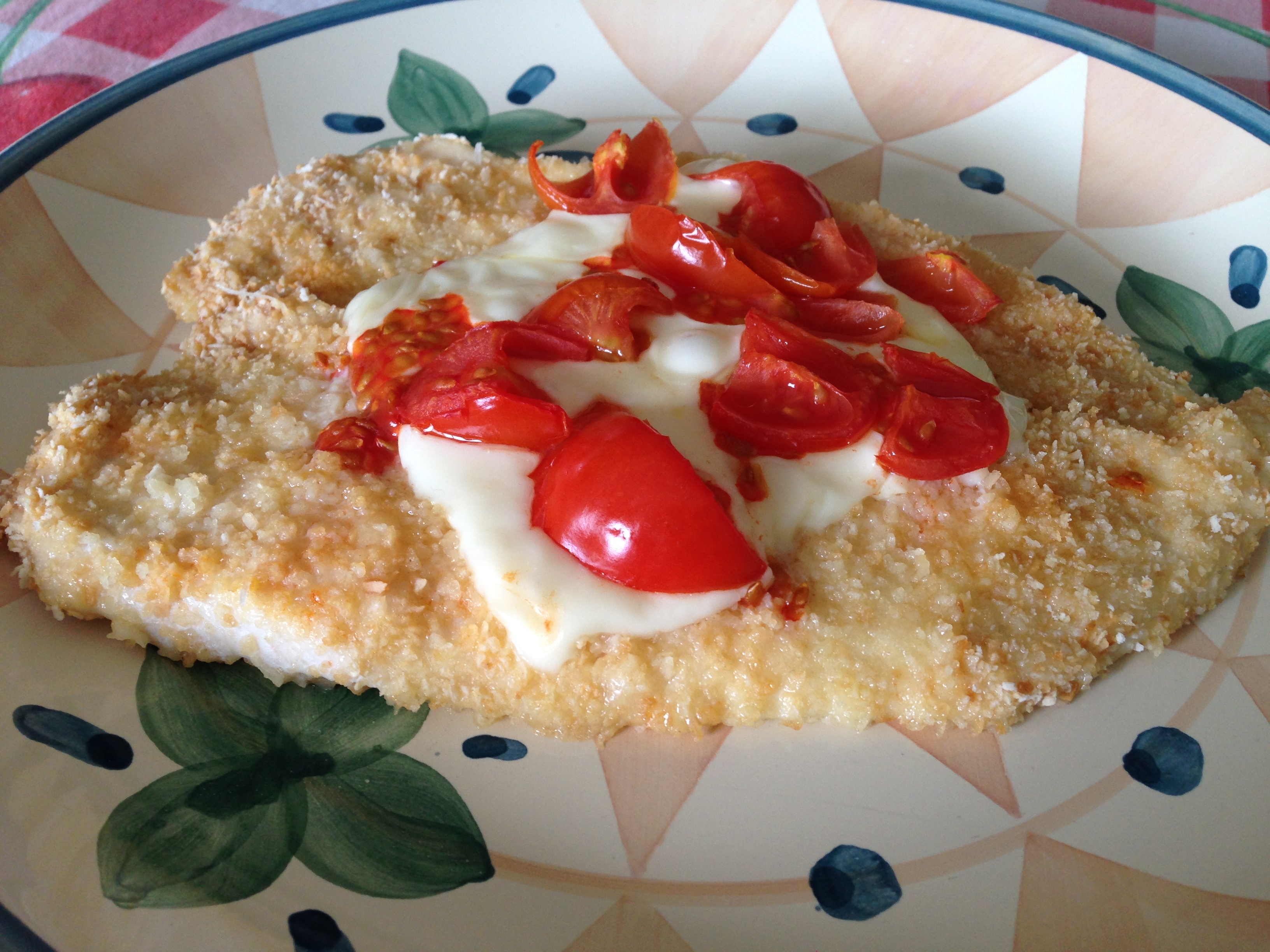 Petto di pollo al forno con sottiletta e pomodorini