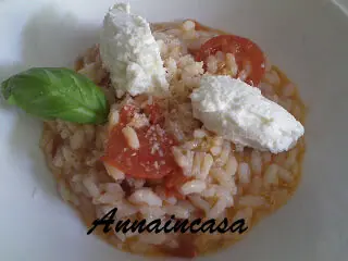 Risotto con pomodorini e quenelle di ricotta