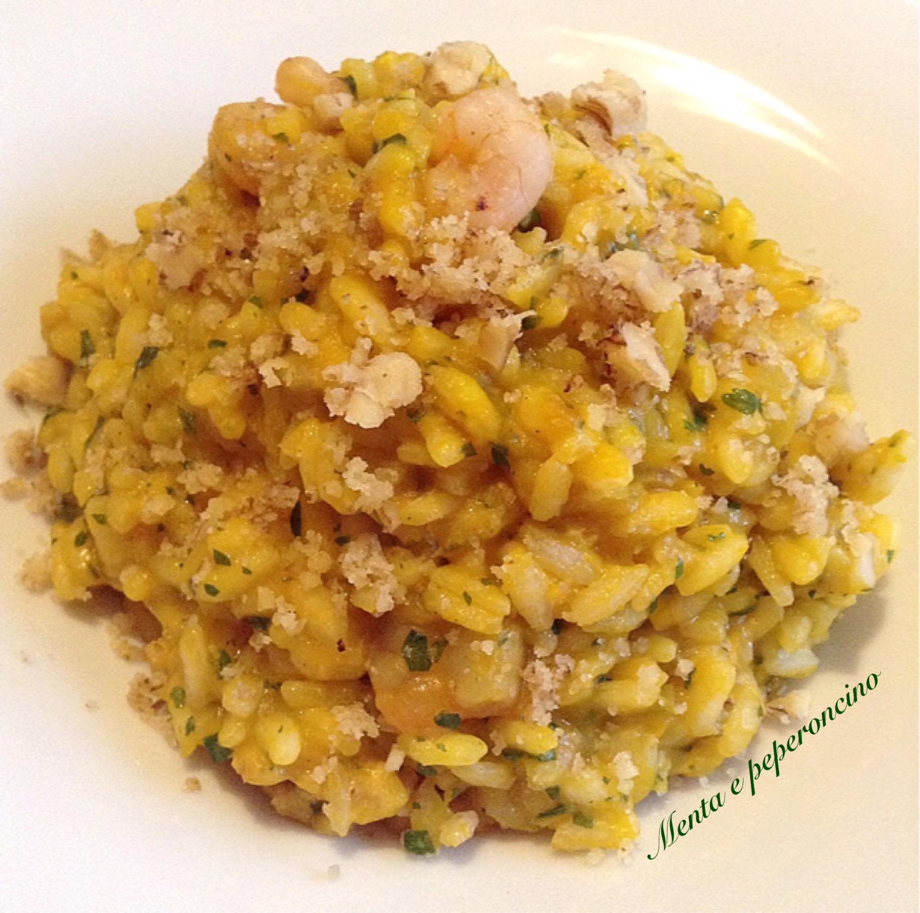 Risotto con zucca gamberetti e noci