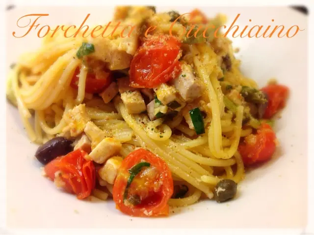 Spaghetti cremosi al ragu’ di pesce spada, mandorle zucchine e capperi