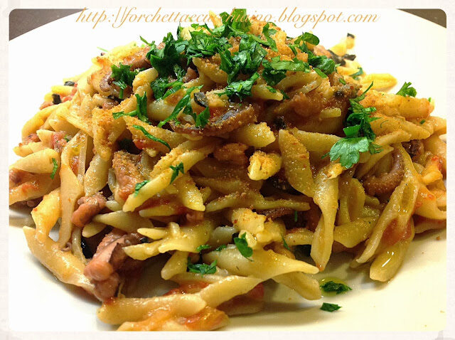 Strozzapreti al ragu’ di polipetti