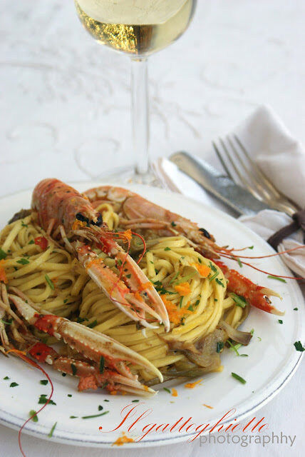 Tagliolini agli scampi e cuori di carciofo profumati all’arancia