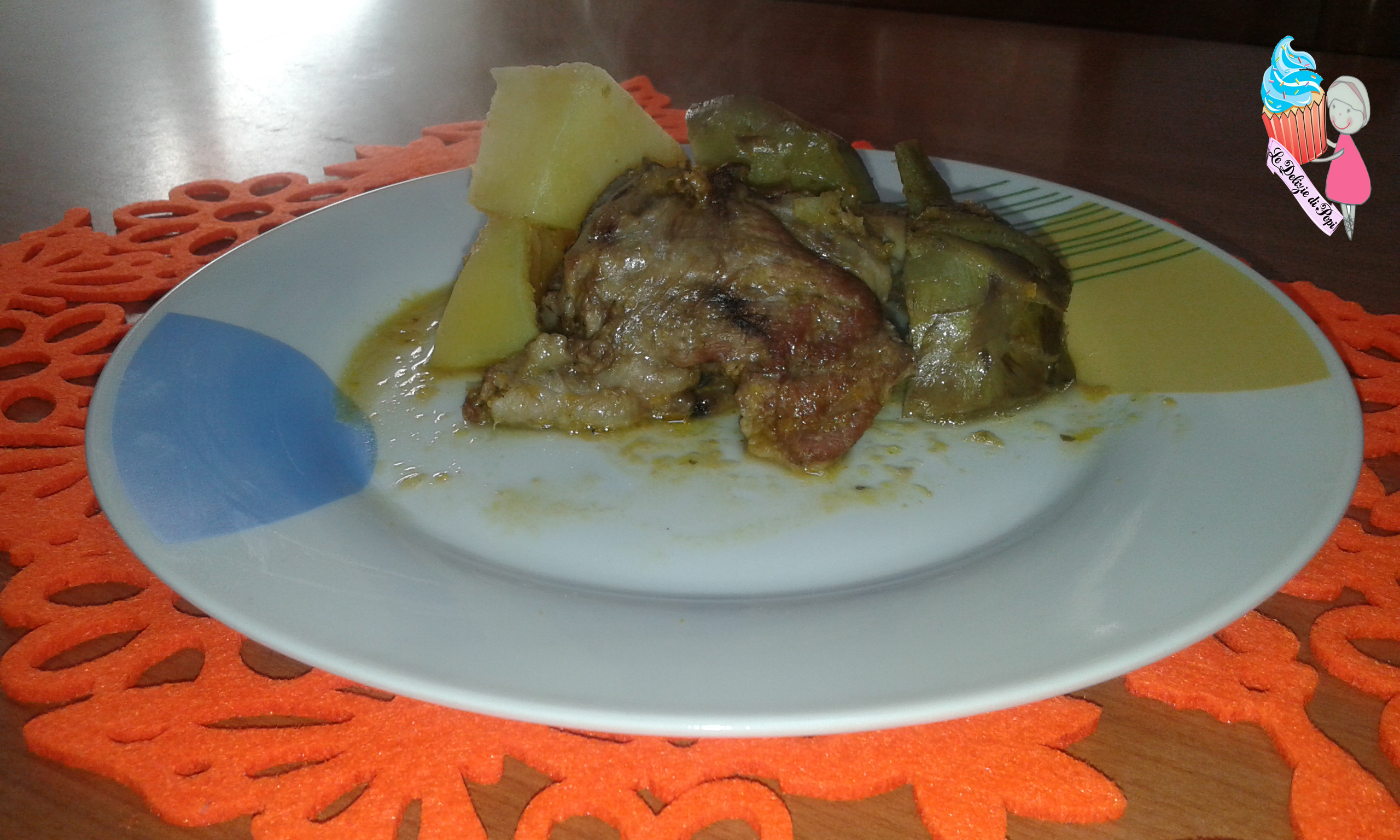 Agnello con carciofi e patate
