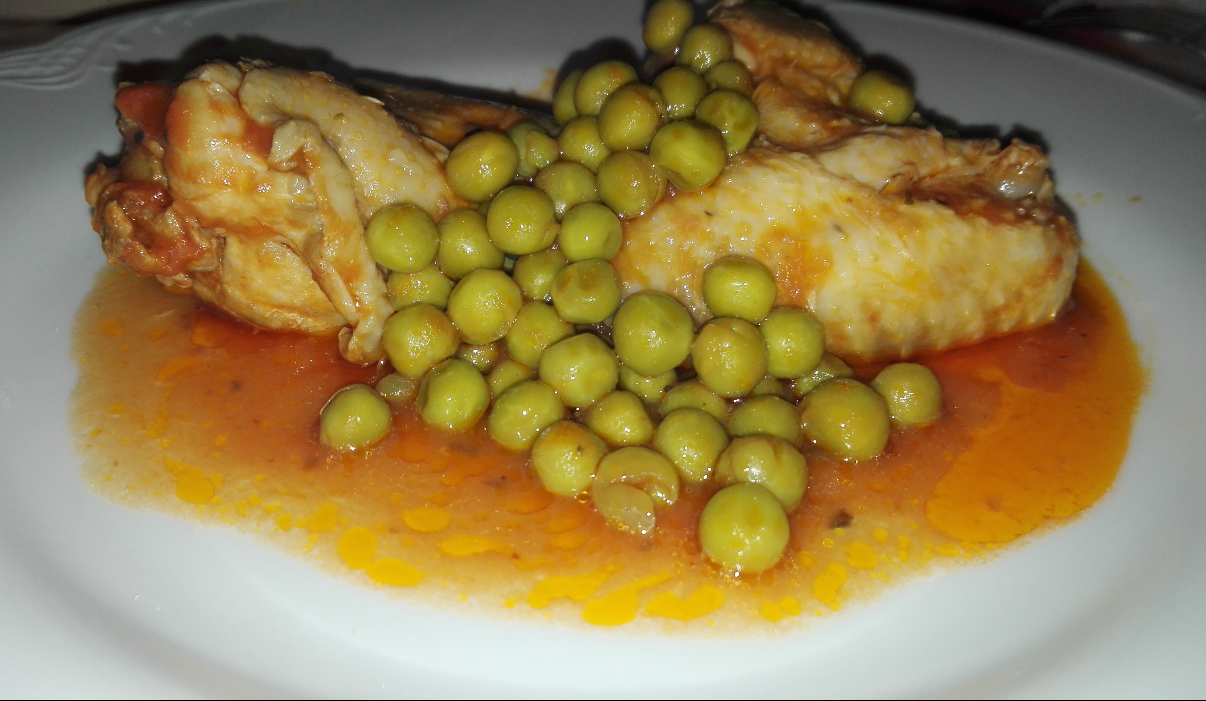 Ali di pollo in umido con piselli