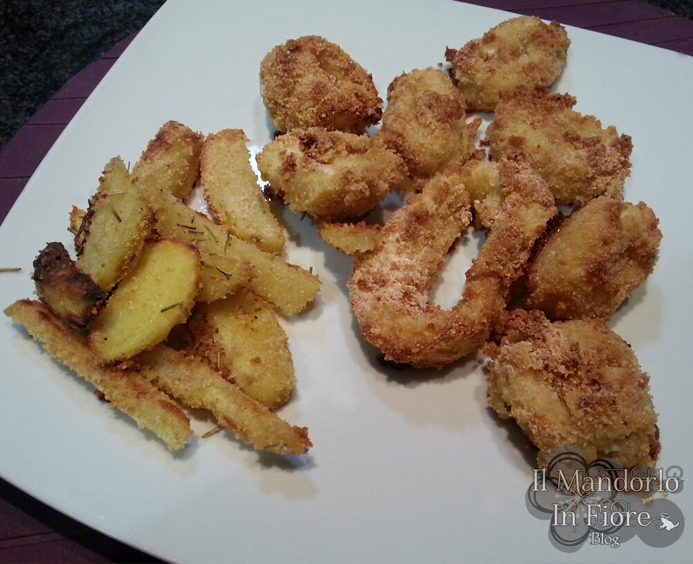 Anelli di calamari impanati e cotti al forno