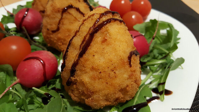 Arancini con ripieno di ragù, pisellini ed emmental….