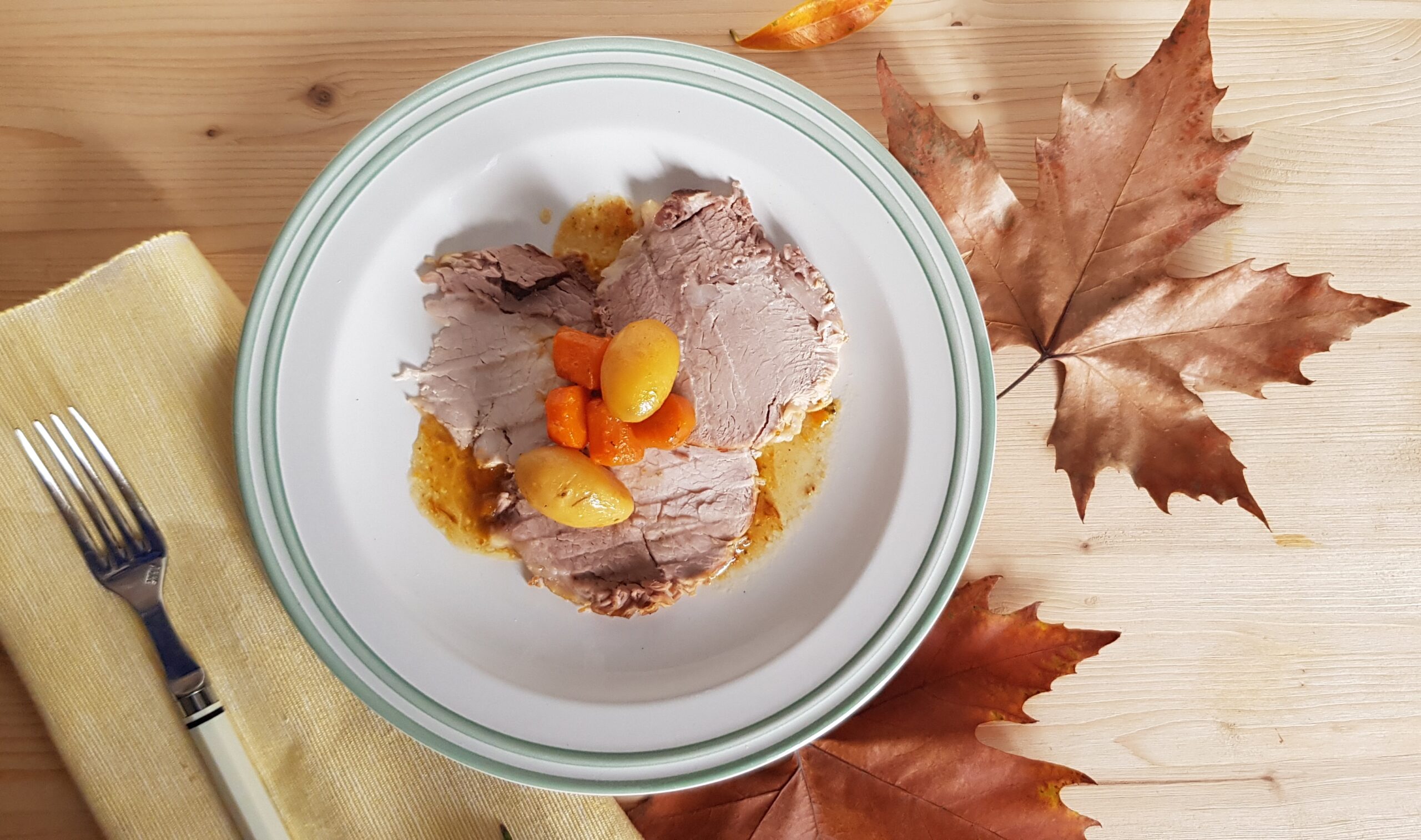 Arrosto di maiale con patate e carote