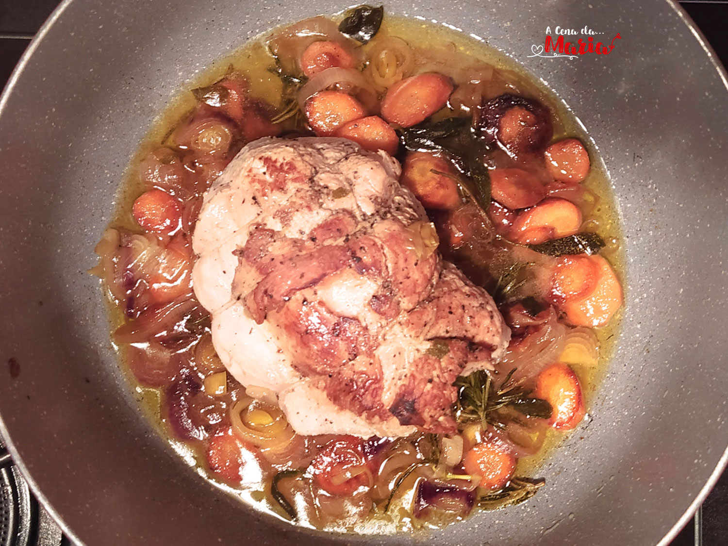 Arrosto di tacchino con carote e cipolle