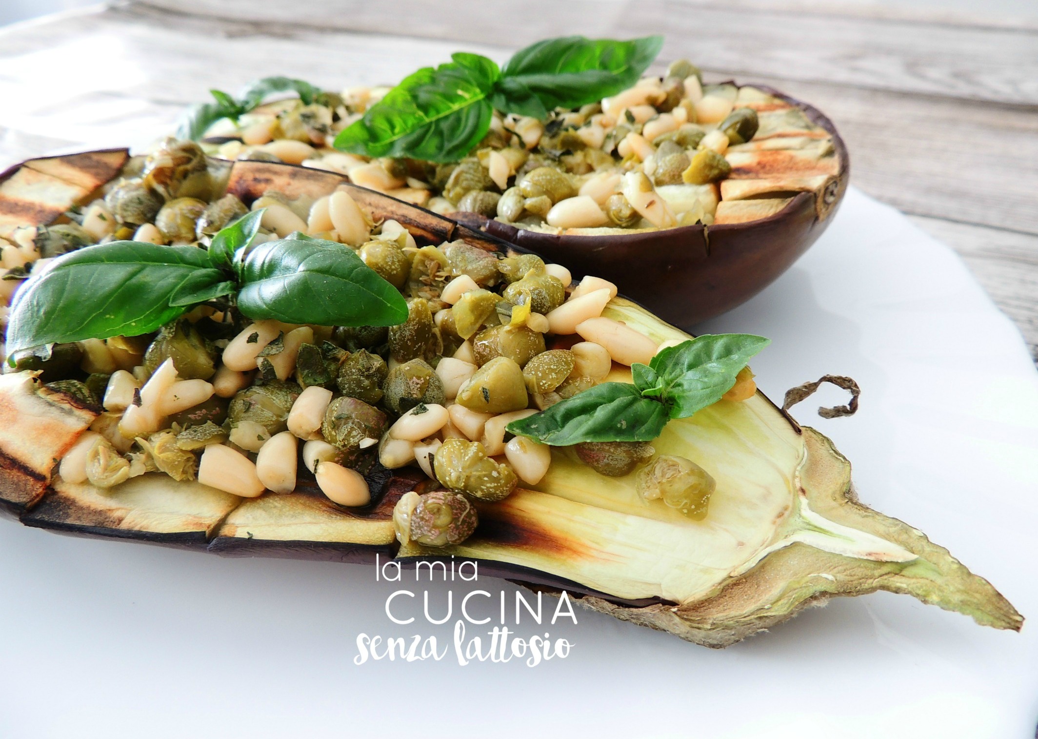 Barchette di melanzane capperi e pinoli