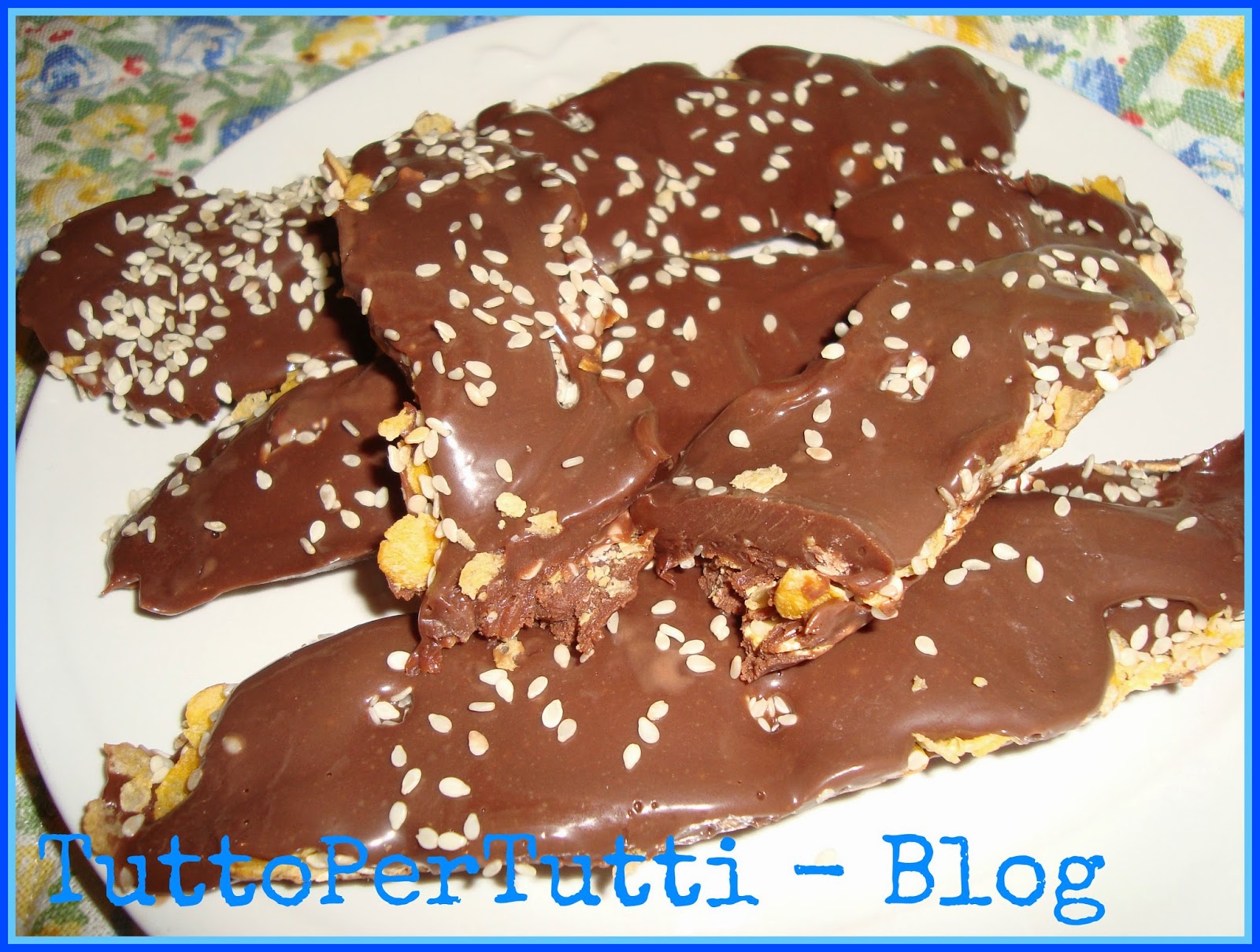 Barrette cereali, cioccolato e sesamo