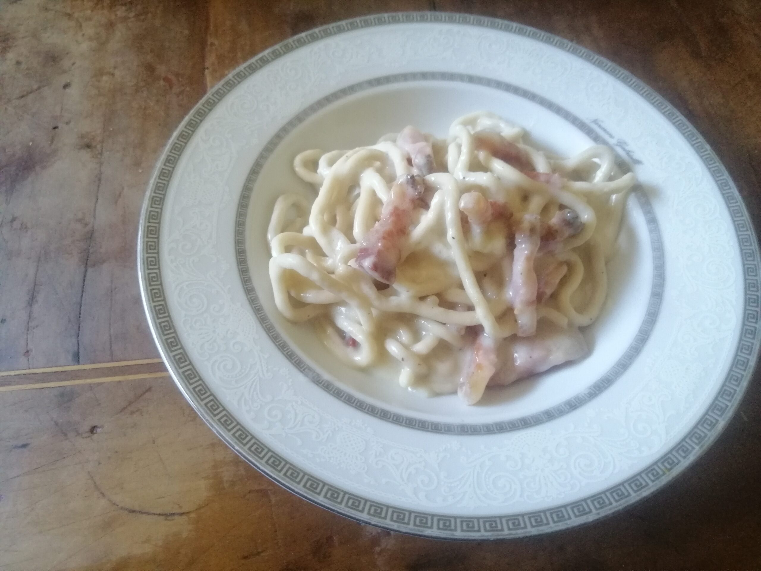 Bigoli con crema di parmigiano e guanciale