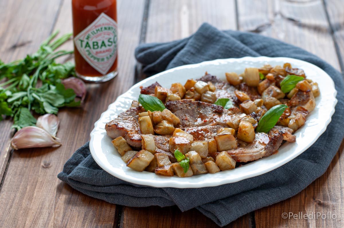 Bistecche di maiale con melanzane e tabasco