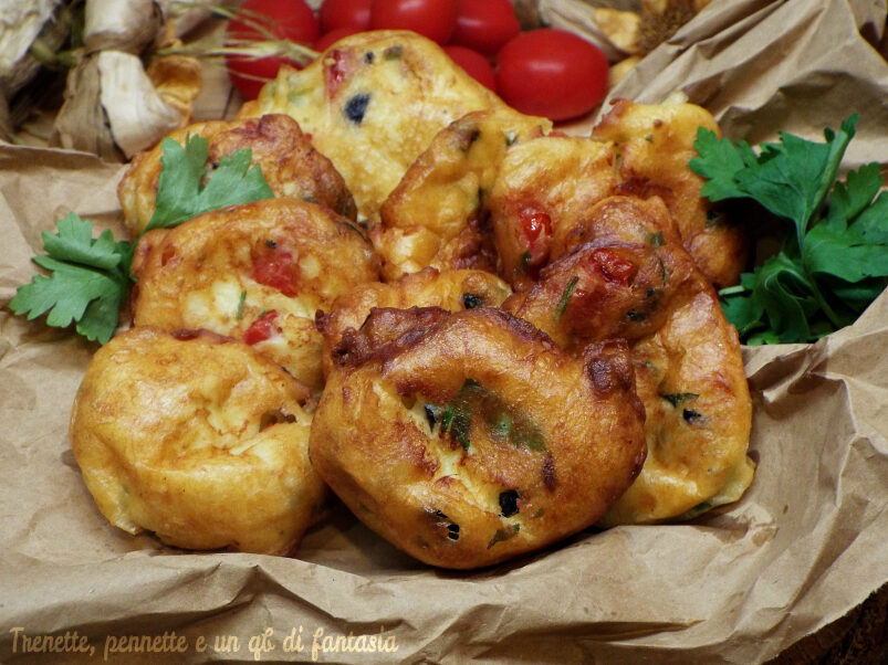 Bocconcini di olive con pomodori e acciughe