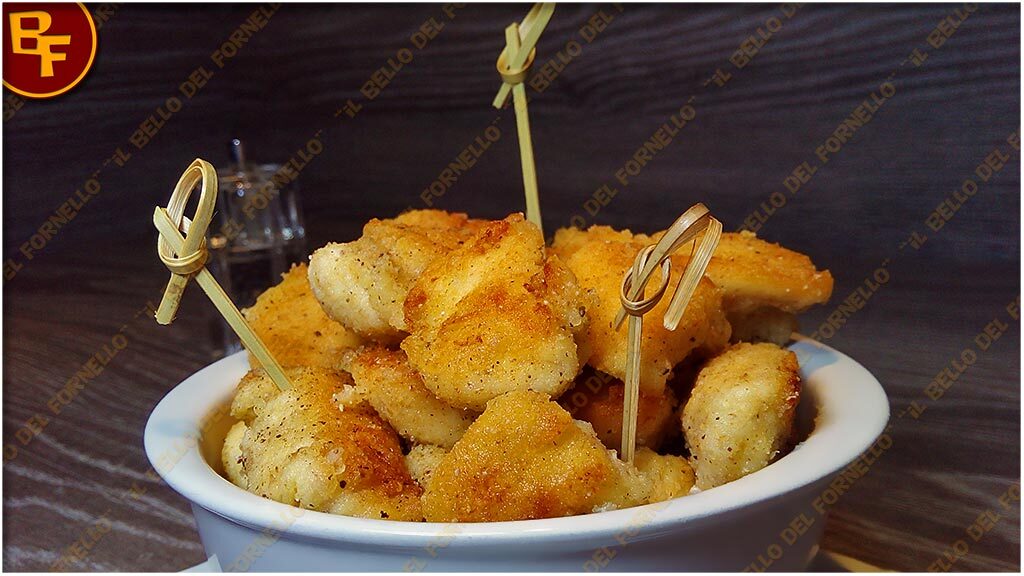 Bocconcini di pollo al curry cotti al forno