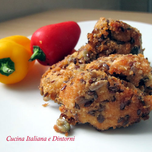 Bocconcini di pollo con panatura di semi vari