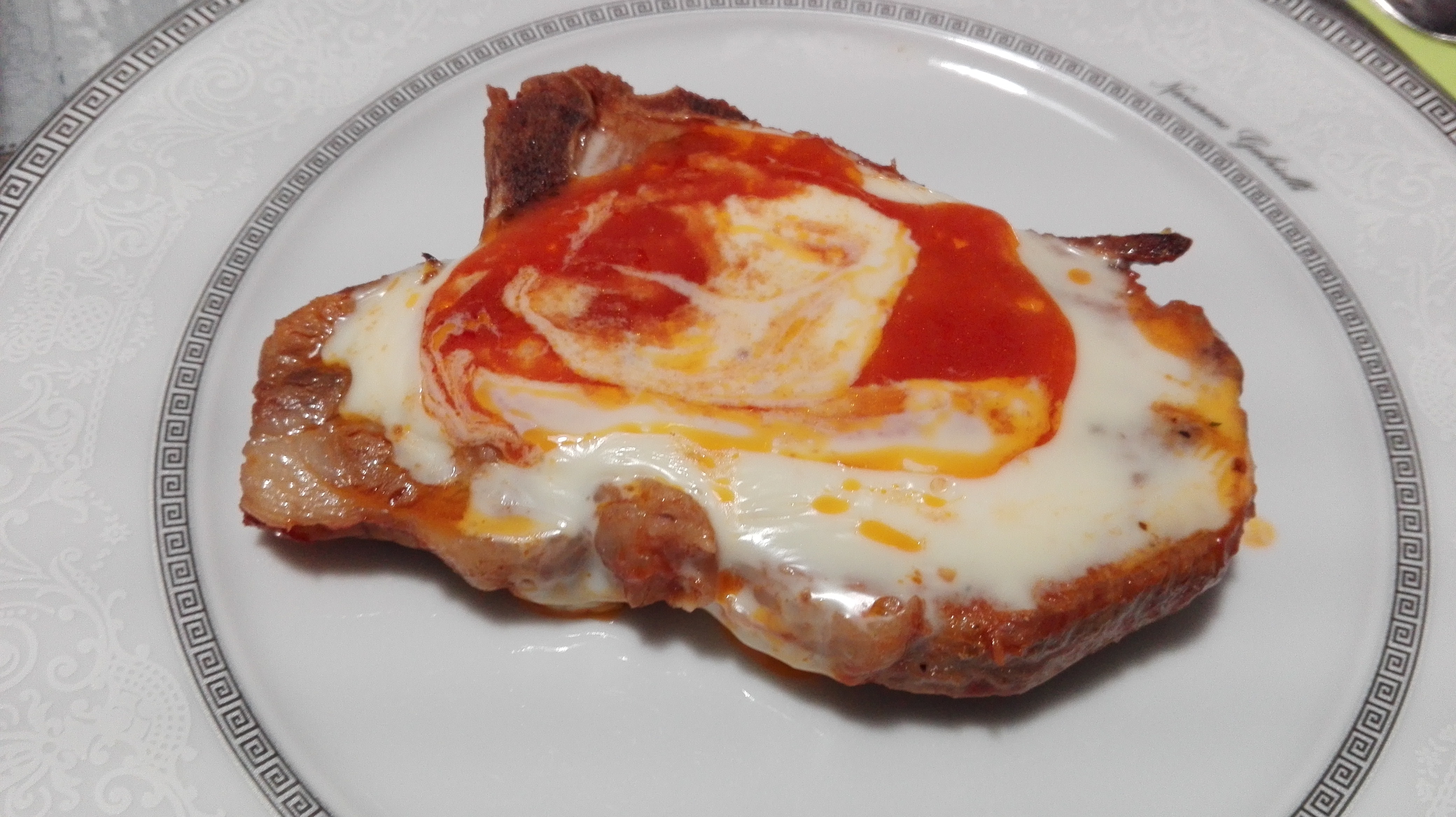 Braciola di maiale al pomodoro