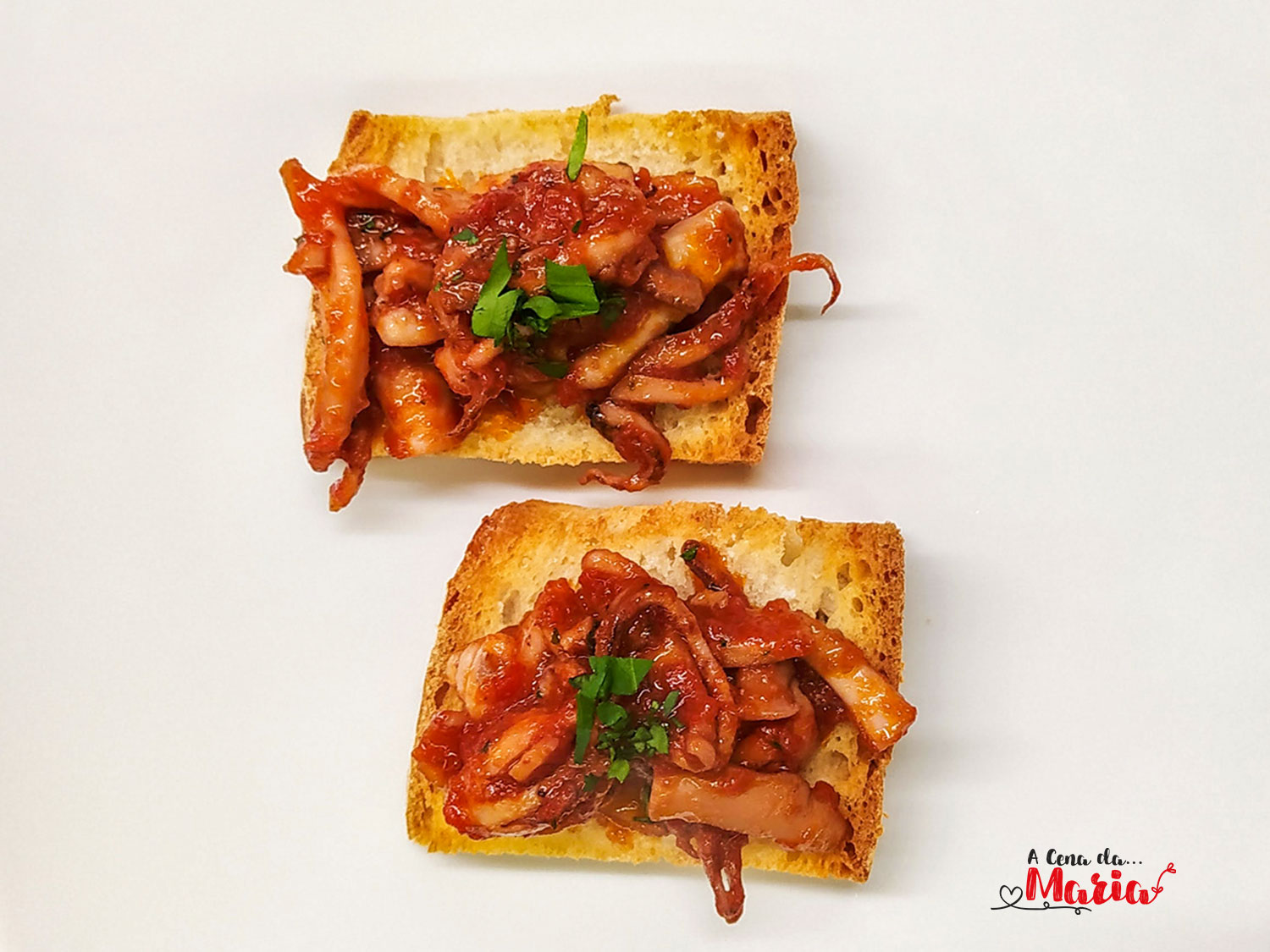 Bruschette con totani al sugo