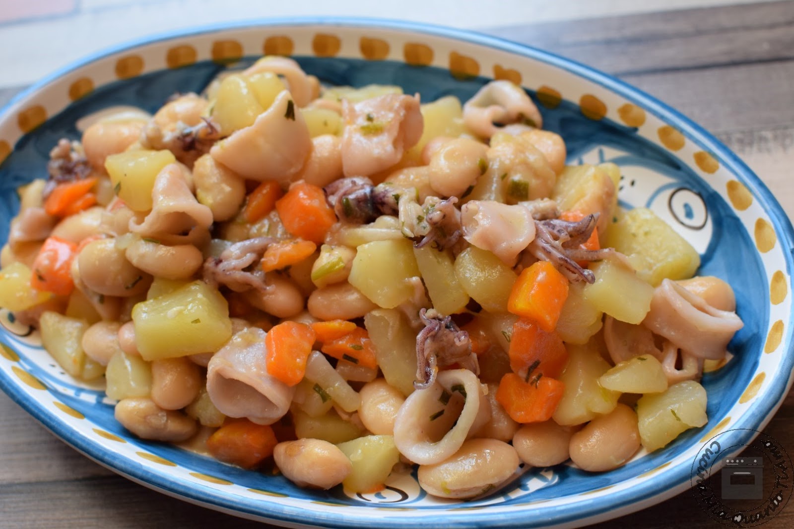 Calamari e fagioli in umido