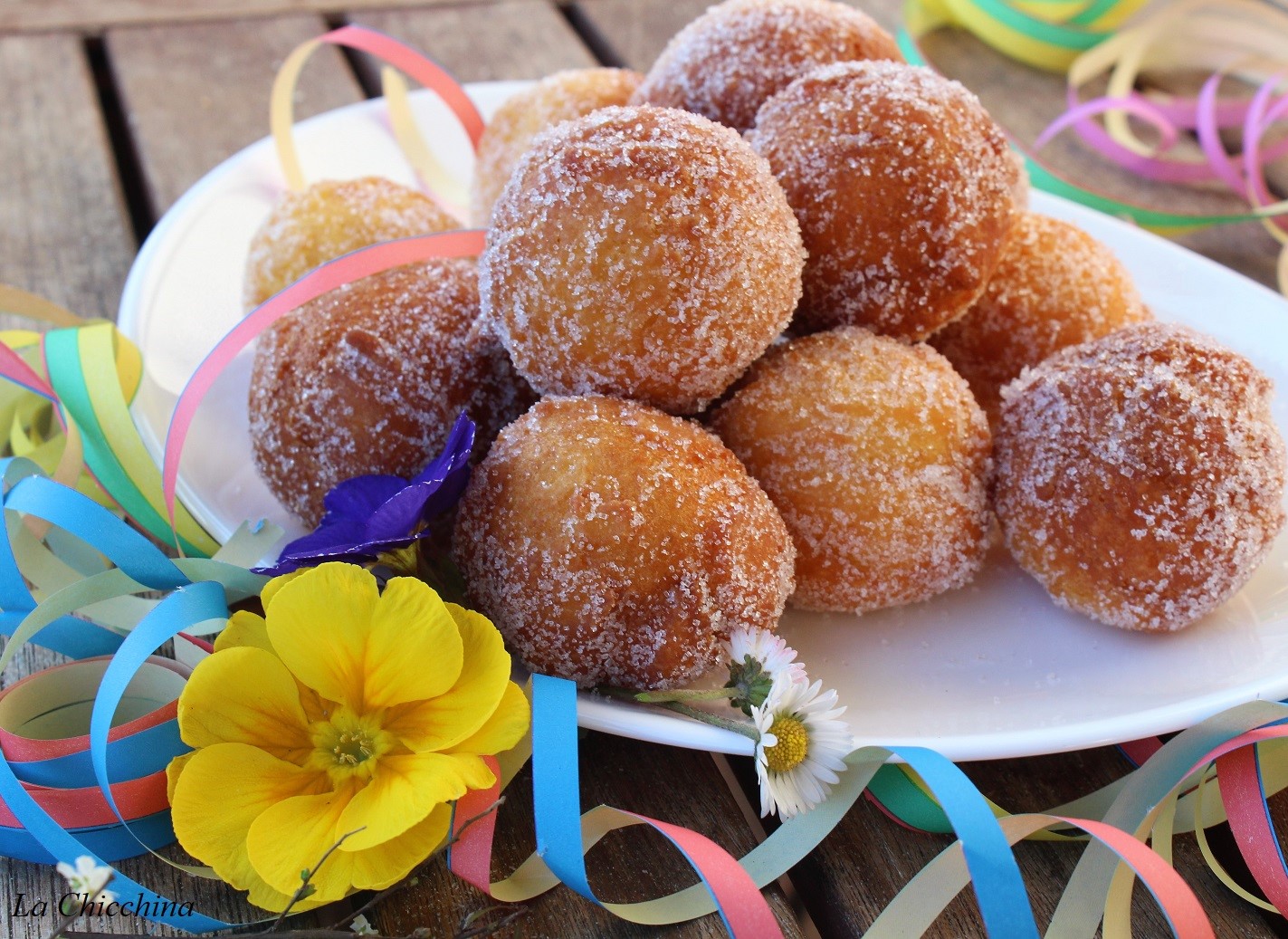 Castagnole alla ricotta profumate con arancia e limone..