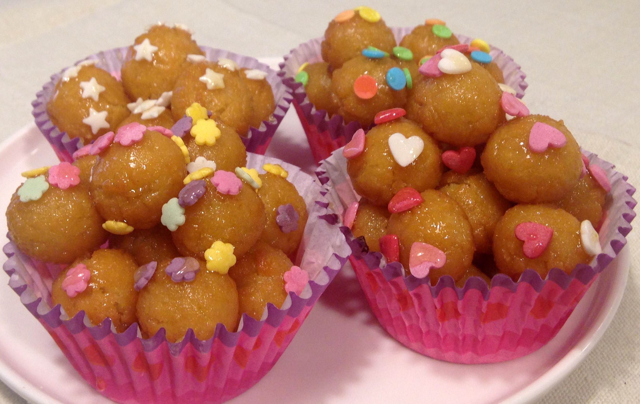 Castagnole alle nocciole caramellate nel miele