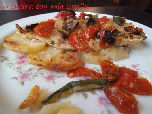 Cernia su letto di patate con pomodorini e zucchine|ricetta secondo pesce