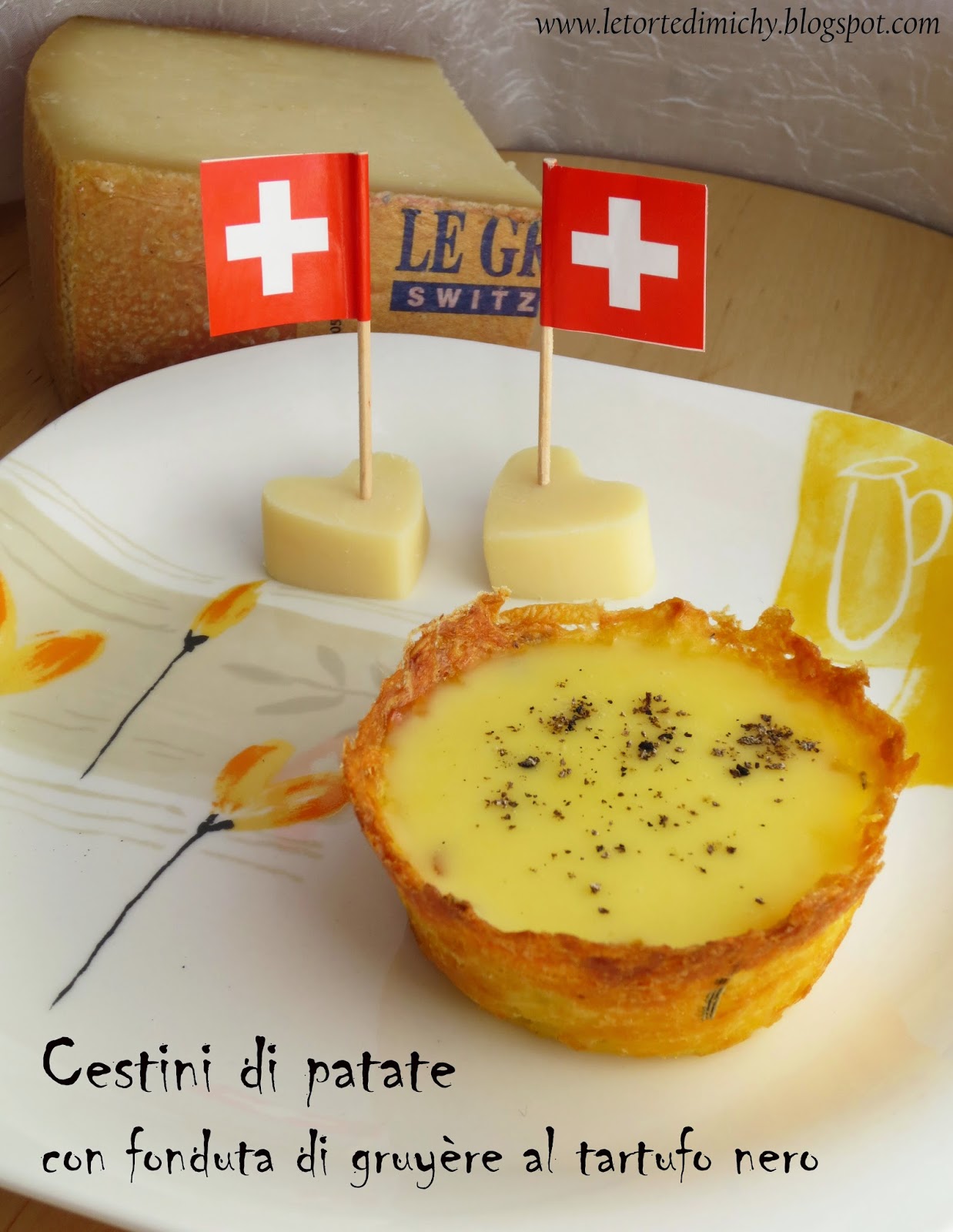 Cestini di patate con fonduta di gruyère al tartufo nero