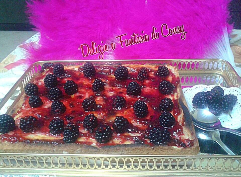 Cheesecake con confettura di frutti di bosco e more