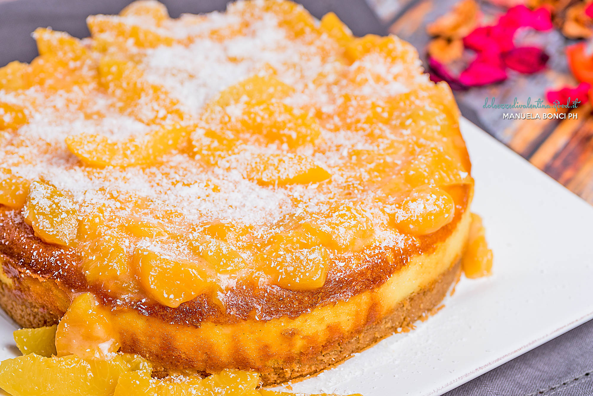 Cheesecake con pesche sciroppate