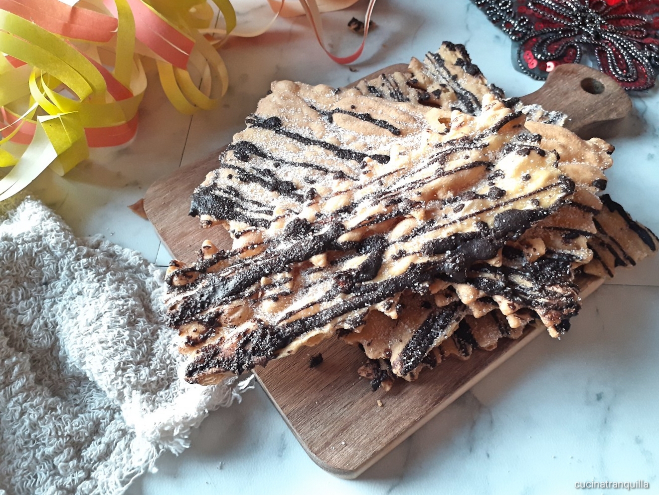 Chiacchiere al cioccolato al forno