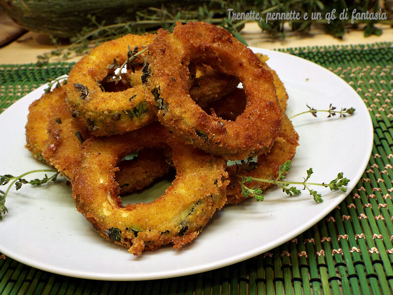 Ciambelle di zucchine fritte all'origano e limone