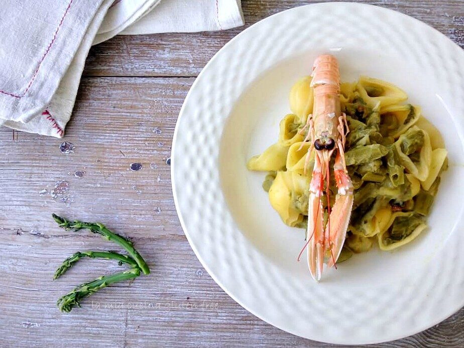 Conchiglie crema di scampi asparagi e piselli