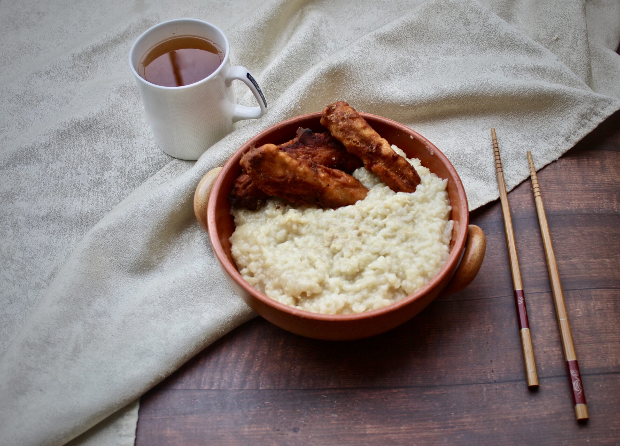 Congee di pollo con youtiao (cina)