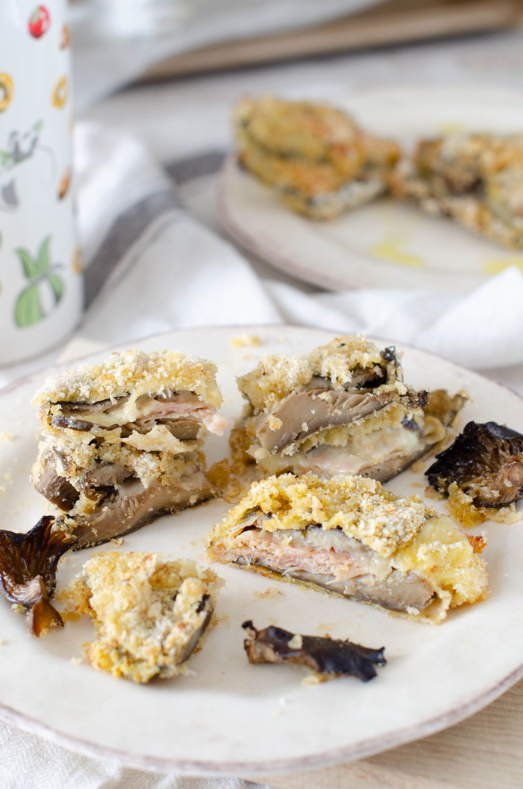 Cordon bleu di funghi pleurotus con prosciutto e formaggio cotti al forno