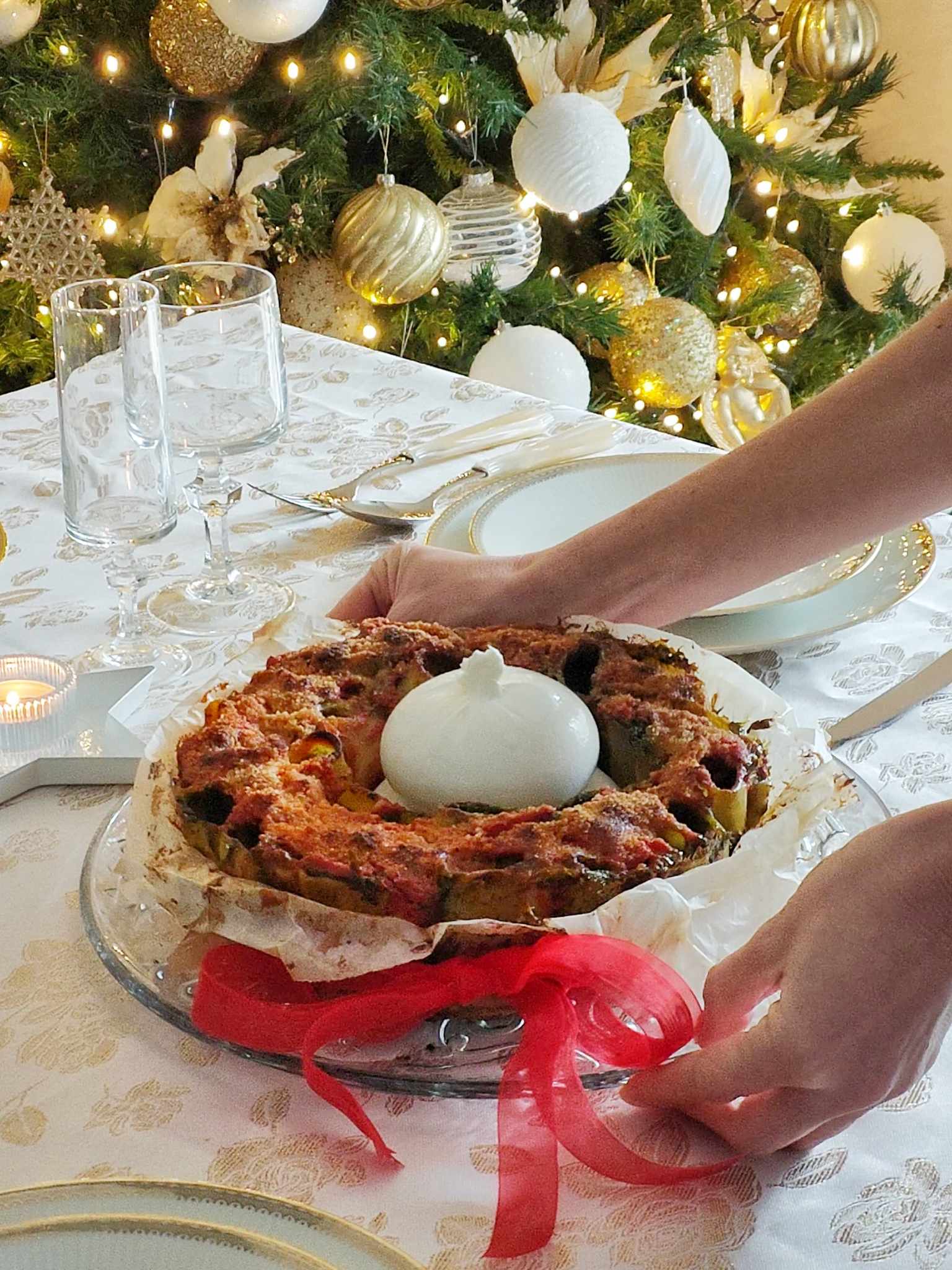 Corona di paccheri al forno ripieni di burrata e spinaci