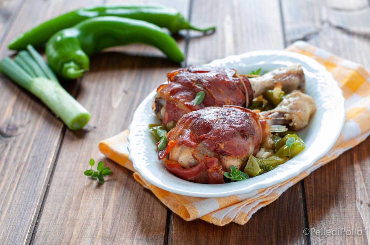 Cosce di pollo con speck al forno