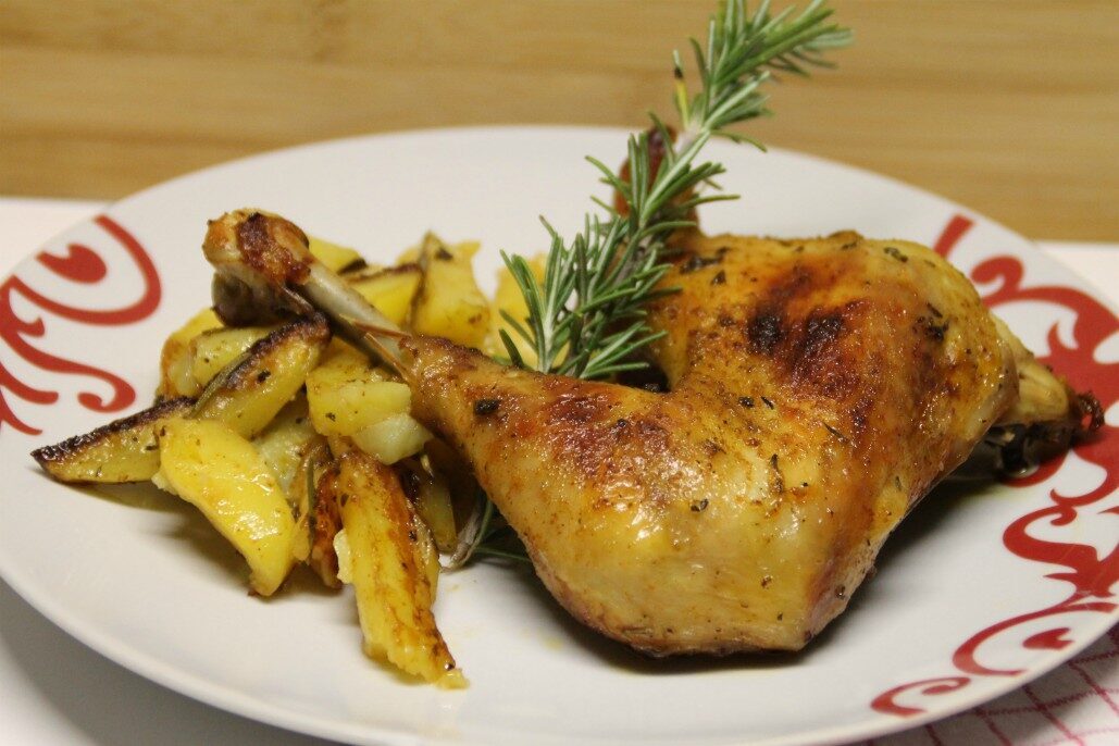 Cosci di pollo e patate arrosto