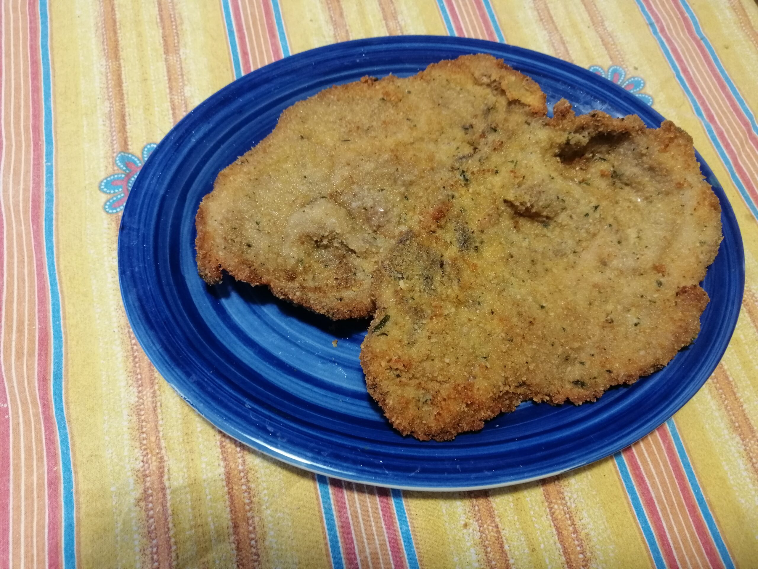 Cotolette di coppa di maiale con erbe aromatiche