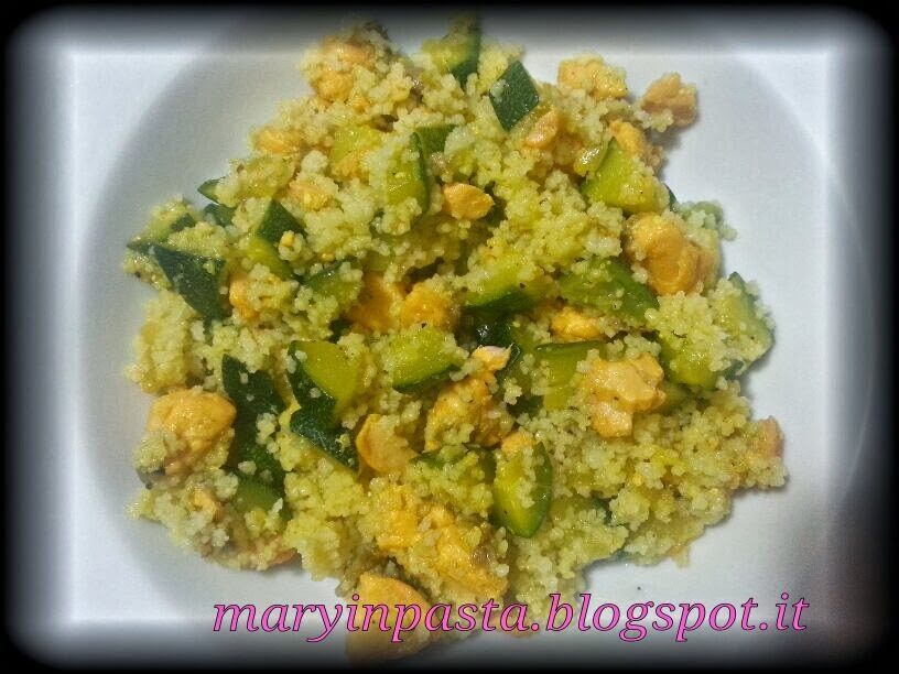 Cous cous con zafferano,zucchine e salmone fresco