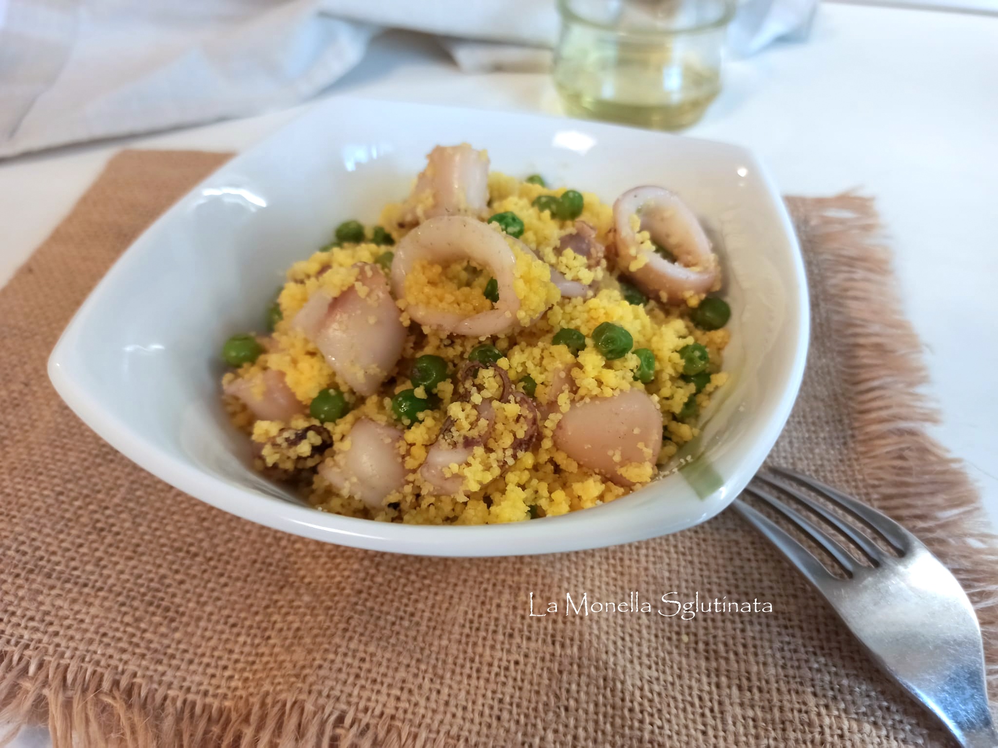Cous cous di mais con calamari e pisellini