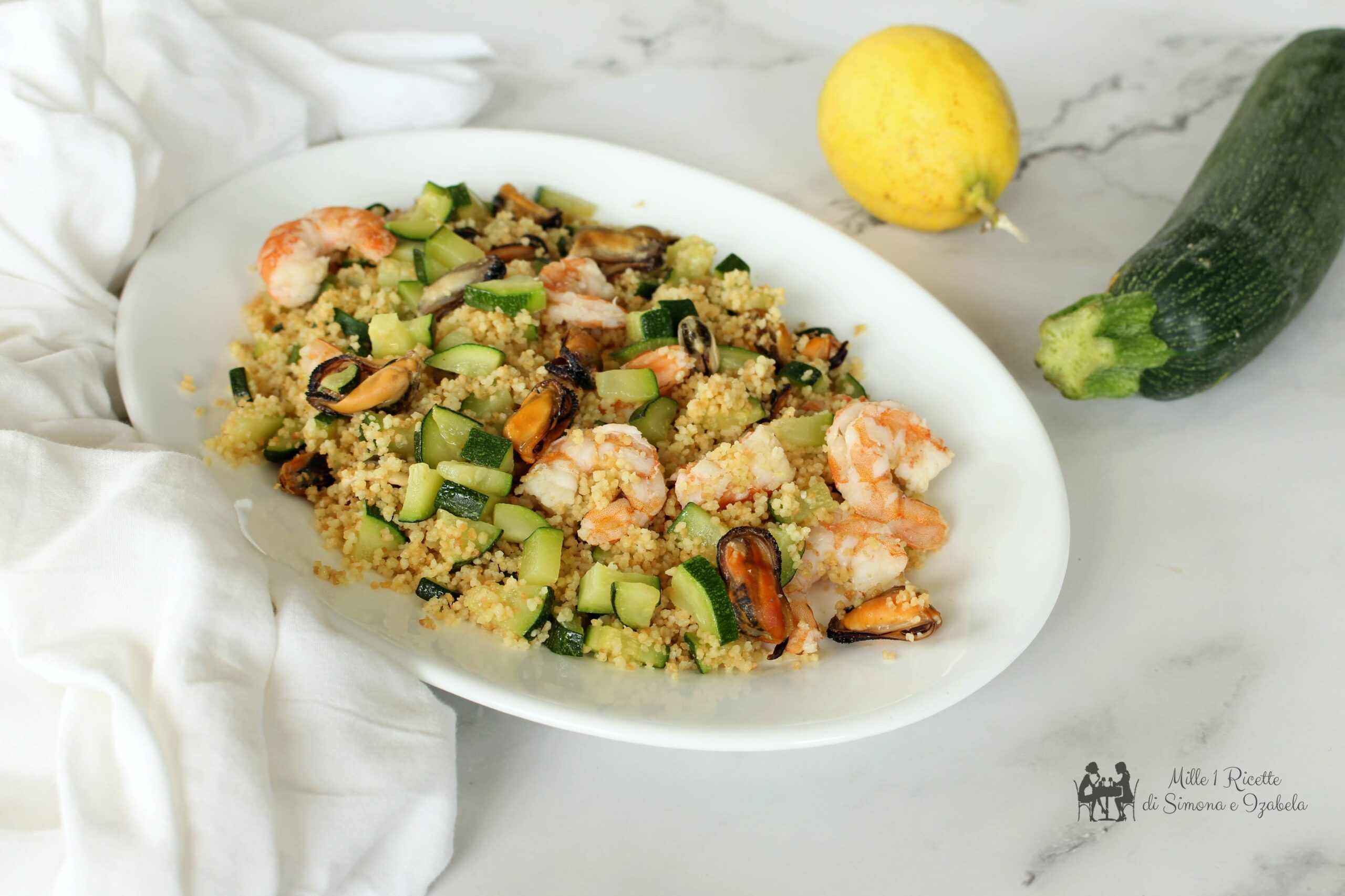 Cous cous profumato zucchine gamberi e cozze