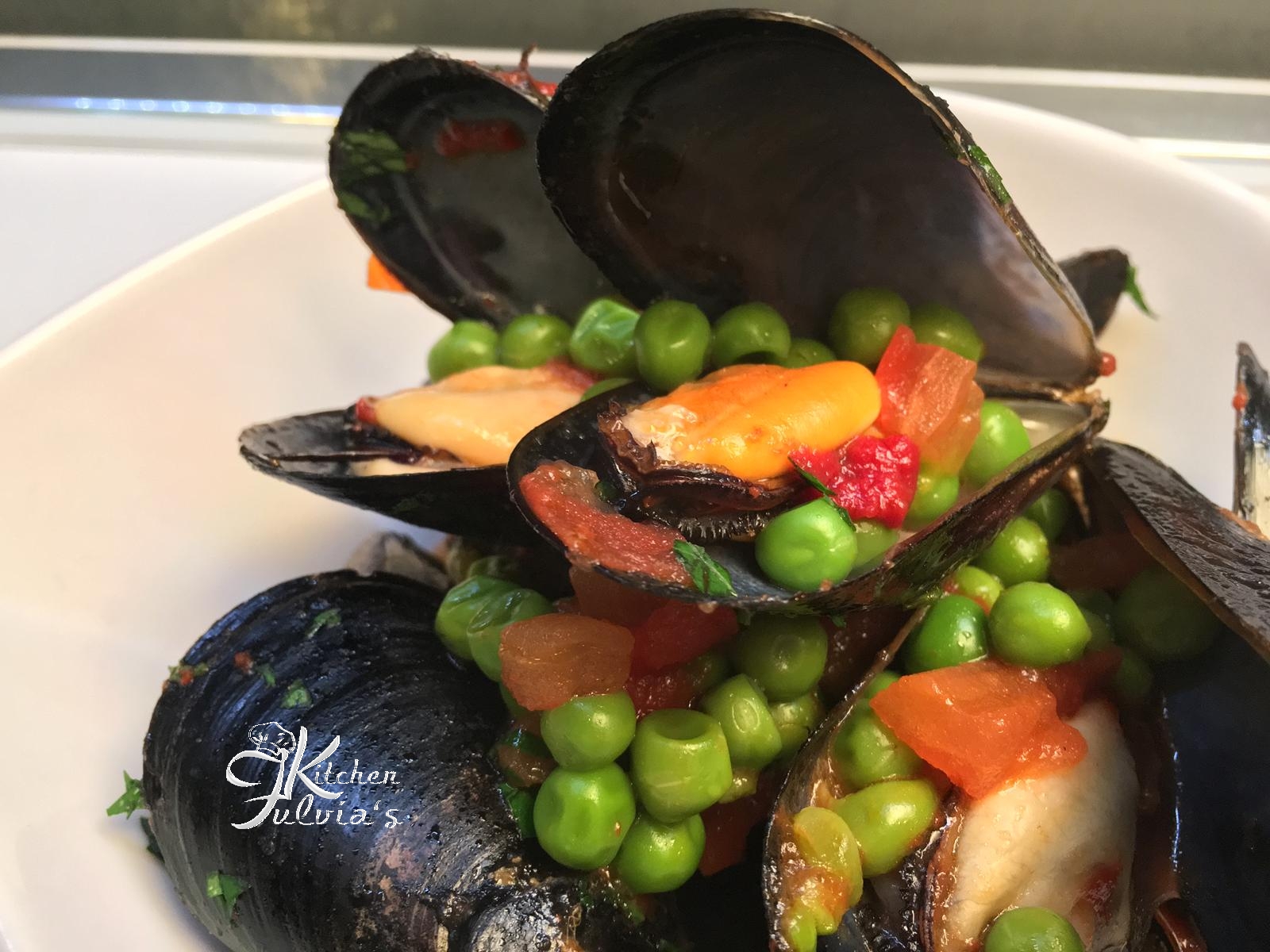 Cozze piselli e pomodori