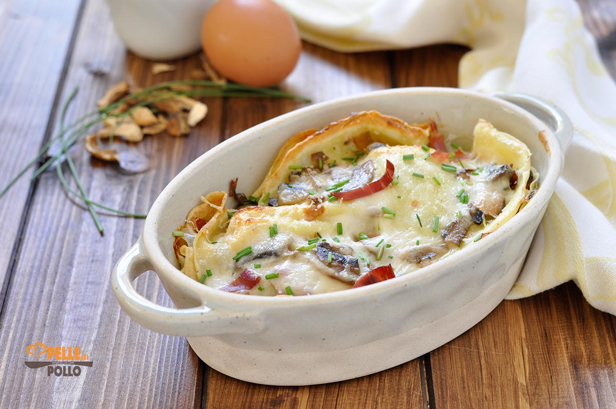 Crespelle ai funghi con speck e besciamella