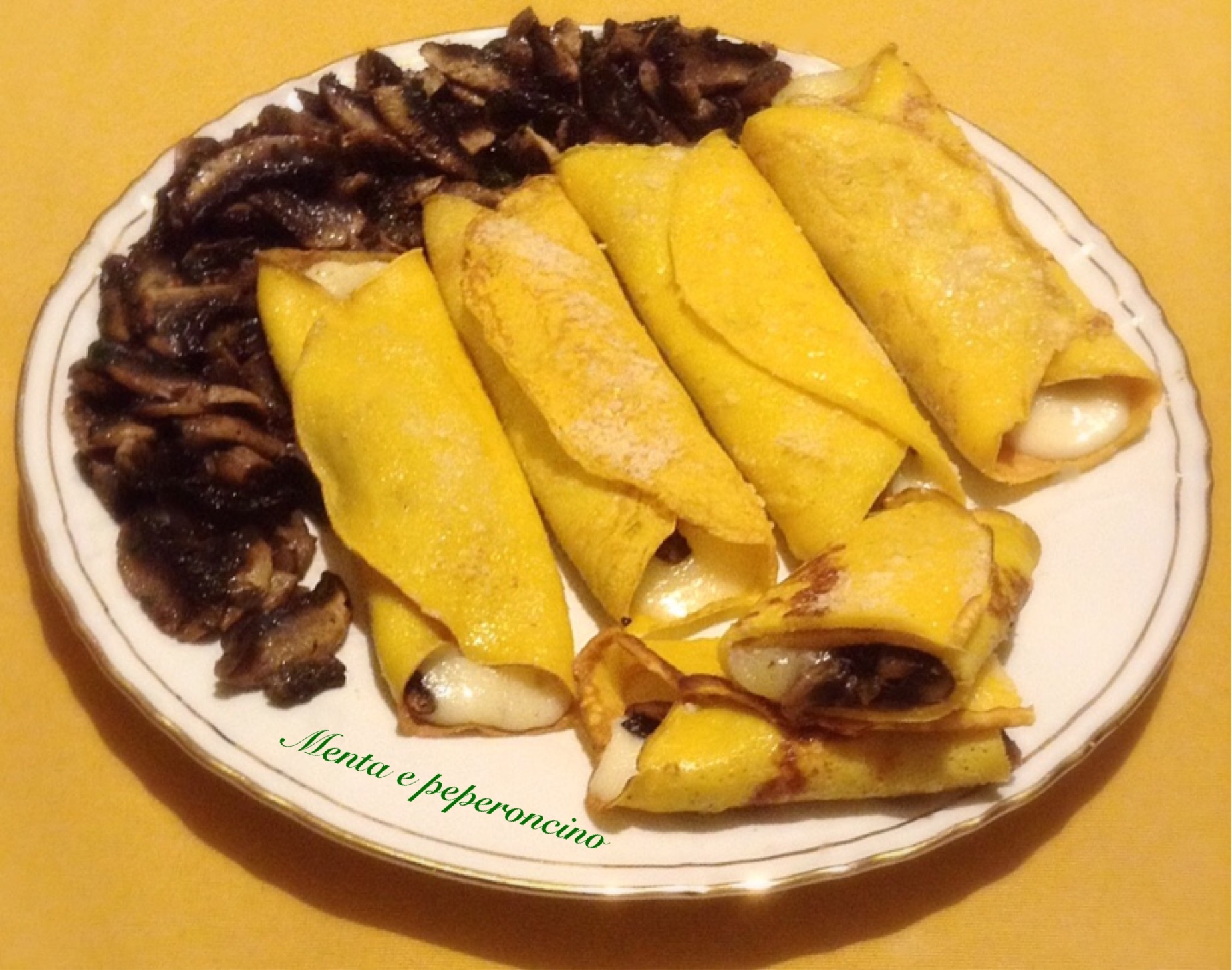 Crespelle con funghi e formaggi
