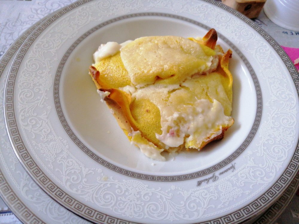 Crespelle gratinate con ricotta e prosciutto cotto
