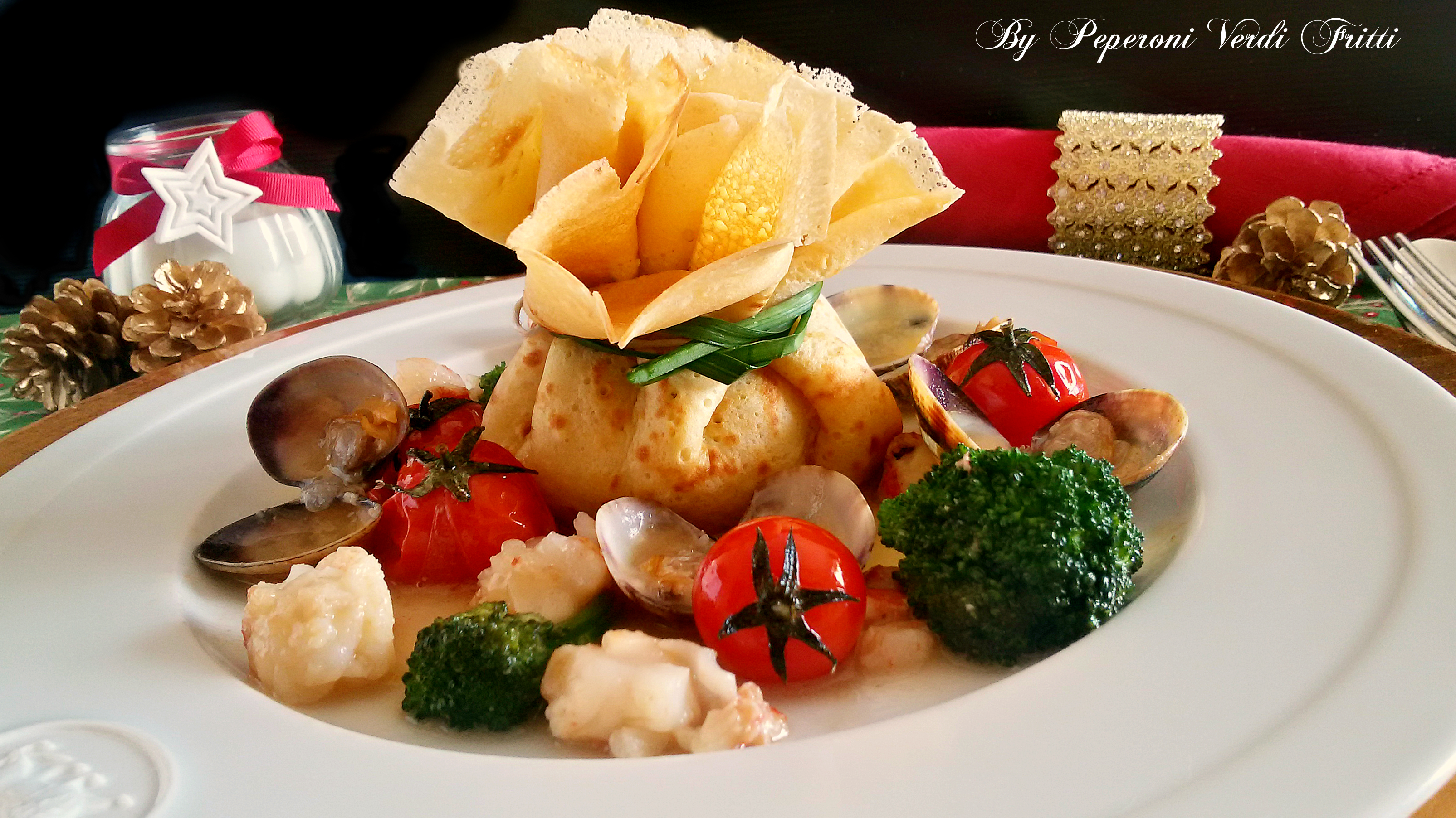 Fagottini di crepes con ricotta broccoletti e frutti di mare