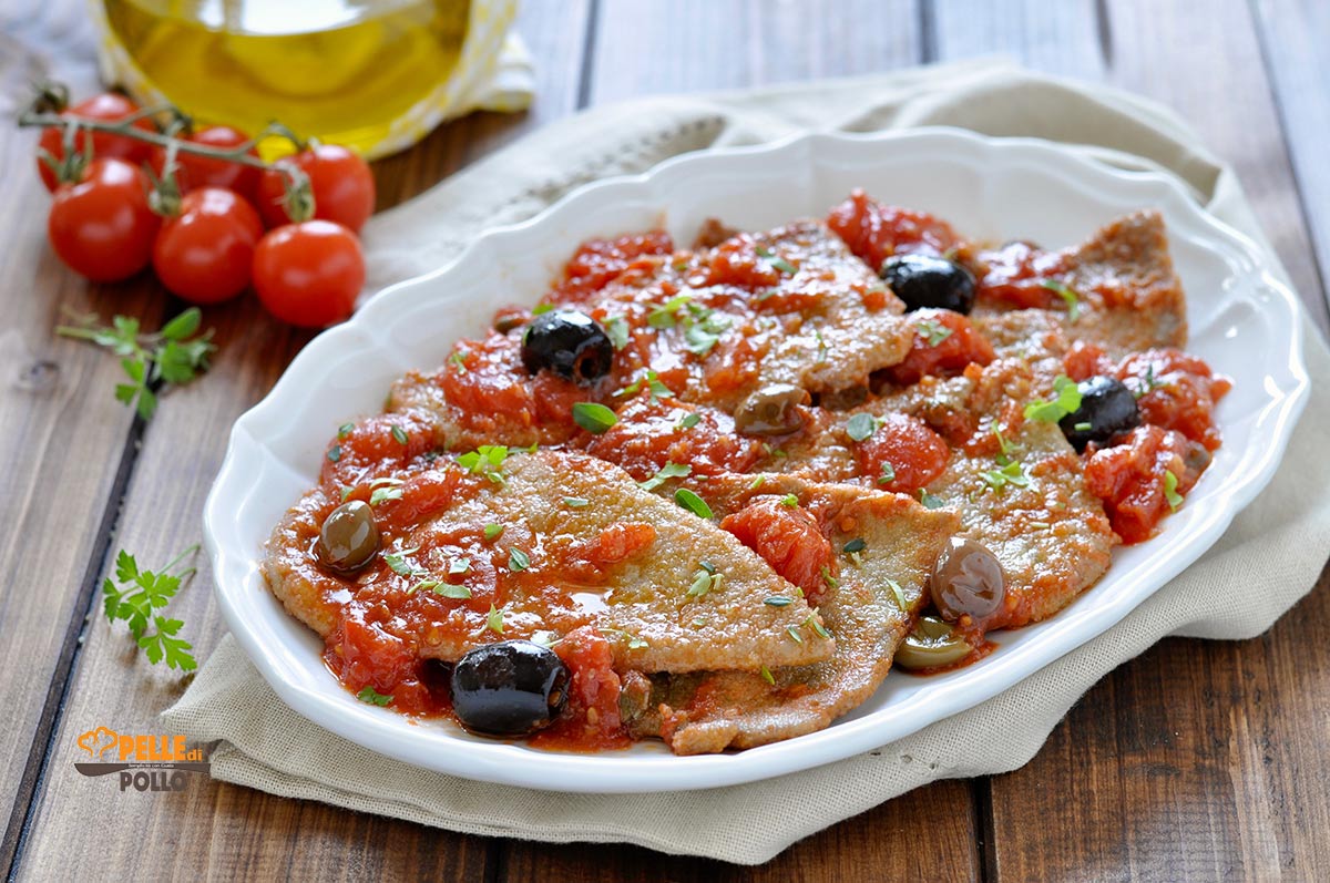 Fettine di manzo al pomodoro olive e capperi